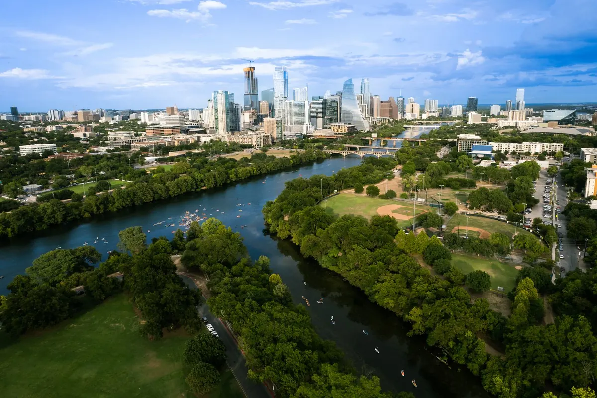 Aerial view of Austin, Texas with the Colorado River and parkland