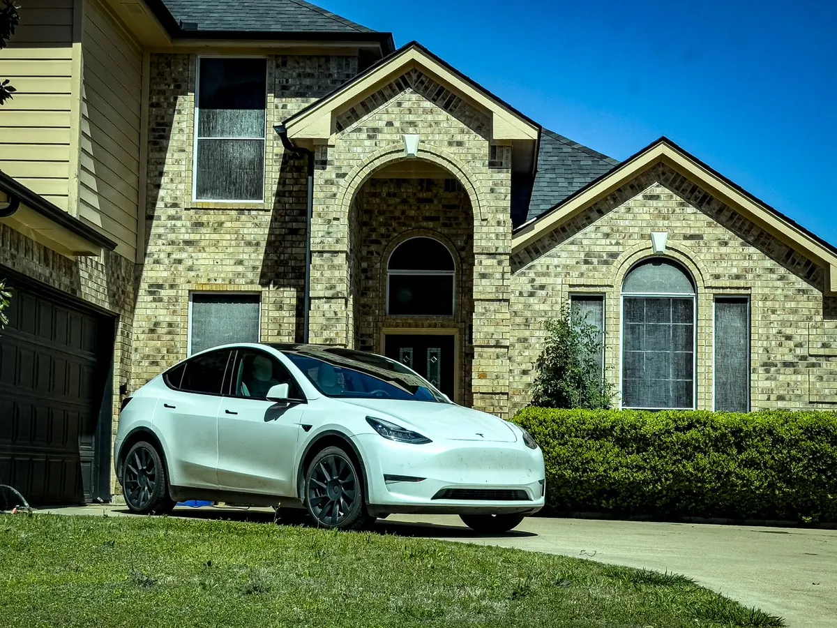 Brick home with a concrete driveway in Mansfield, Texas